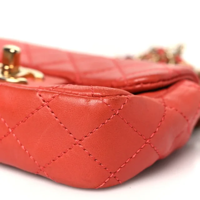 Chanel Quilted Extra Mini Cruise Charm Flap Coral in Lambskin from FASHIONPHILE, photo 9 of 10