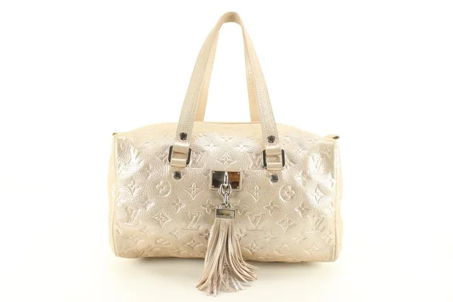 Louis Vuitton Metallic Champagne Leather Monogram Comet Boston Bag in Leather from Bagriculture