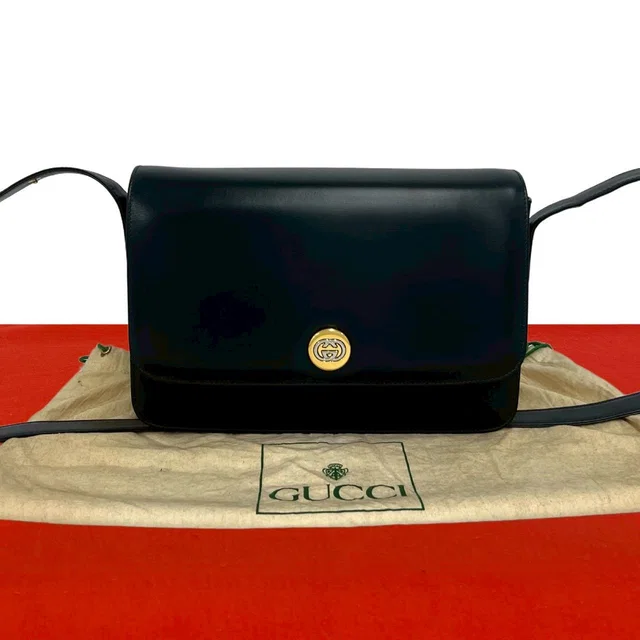 Gucci Vintage GG Logo Leather Mini Shoulder Bag Pochette Navy in Navy Leather from The Reluxe