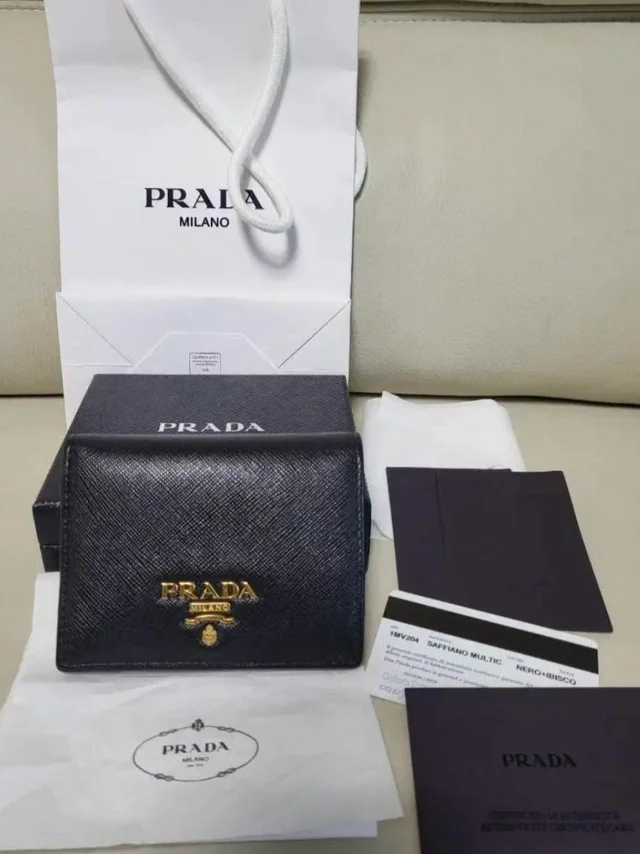 Prada Black Saffiano Leather Wallet With Gold Logo in gold|black Saffiano leather from Poshmark