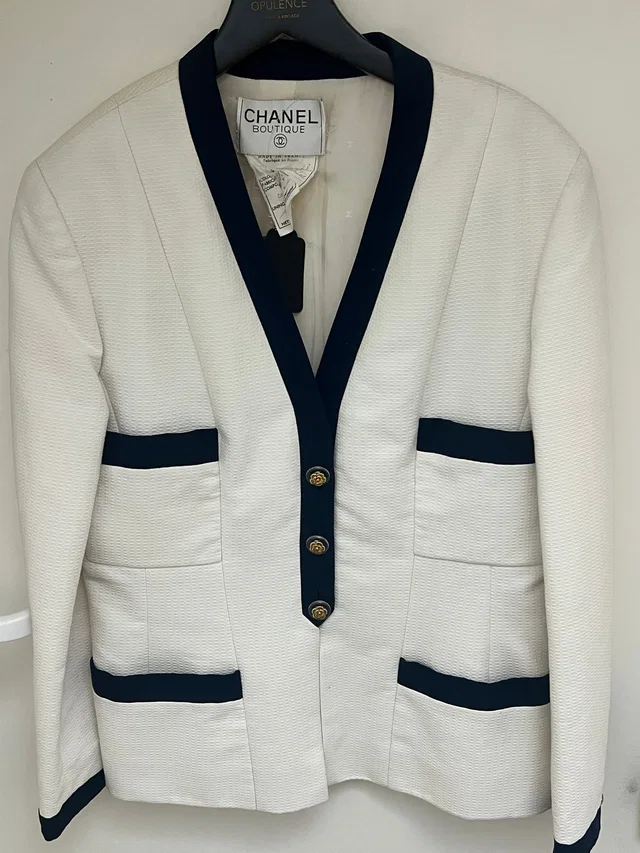 Chanel vintage 90's Camelia button jacket from Luxury Promise