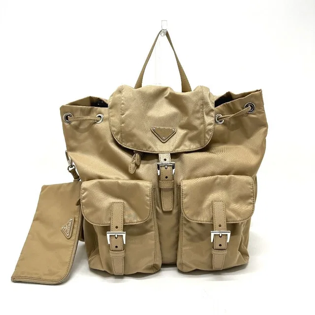 Prada Backpack Triangle Logo Nylon Beige in Beige Nylon from The Reluxe