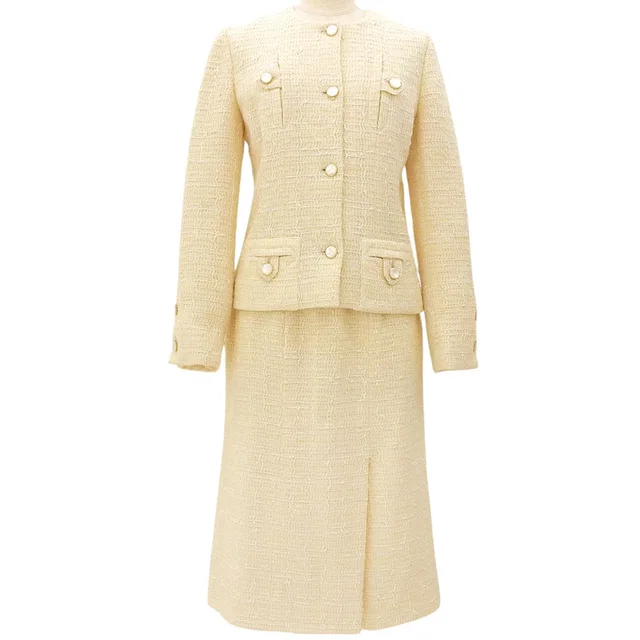 Chanel Tweed set-up in beige in Beige Tweed from VINTAGE QOO TOKYO