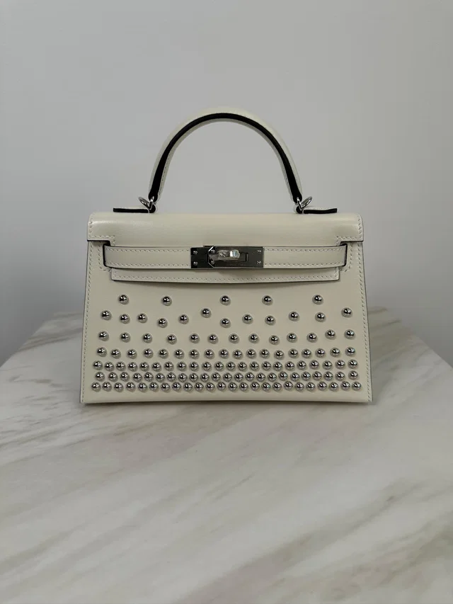 Hermès Mini Kelly Cloute Cream Palladium Hardware G in White from Luxury Promise
