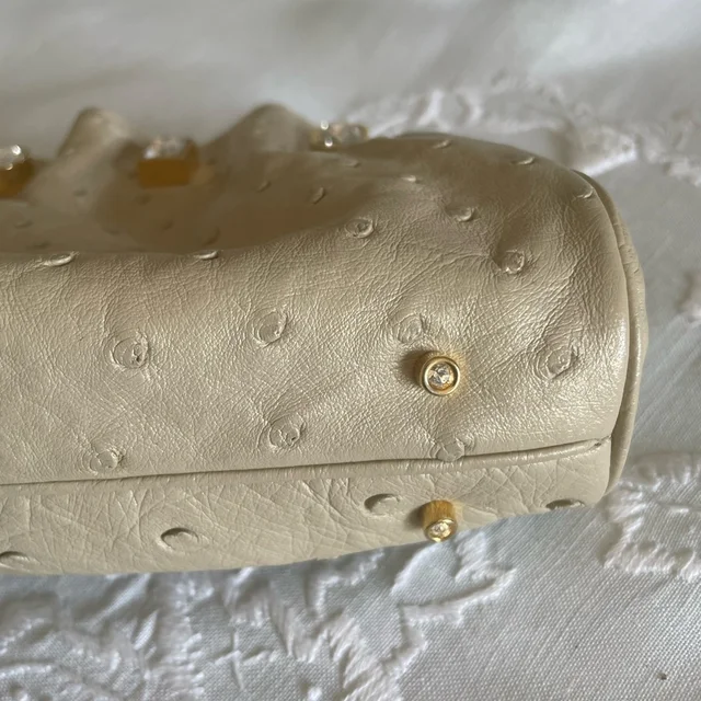 Judith Leiber Clutch With Crystal Accents 11”L 4” H 2” W in gold Ostrich from Poshmark, photo 5 of 6