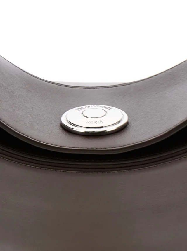 Jacquemus 'Le Calisso Rond Large' Brown Shoulder Bag with Adjustable Strap and Embossed Logo in Leather Woman in Brown 100% CALF, photo 9 of 12 from Gaudenzi Boutique