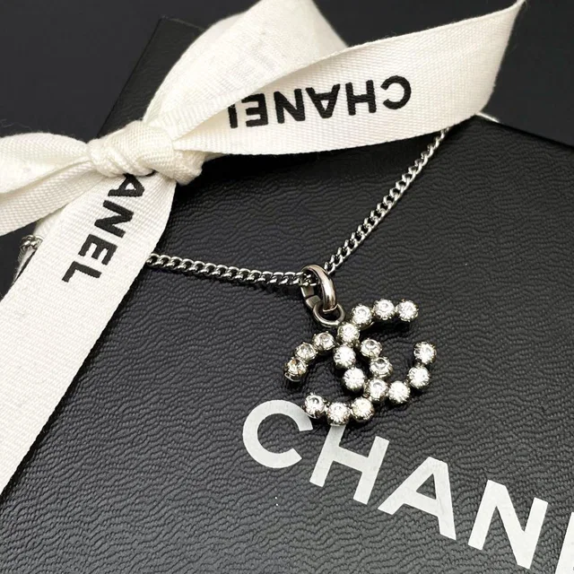 Chanel 00A CC Logo Necklace Rhinestone Icon Coco from The Reluxe