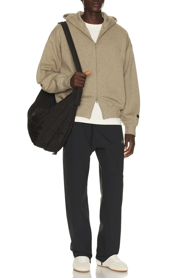 Fear of God ESSENTIALS Signature Track Pant in Vintage Black, photo 4 of 6 from REVOLVE (Canada)