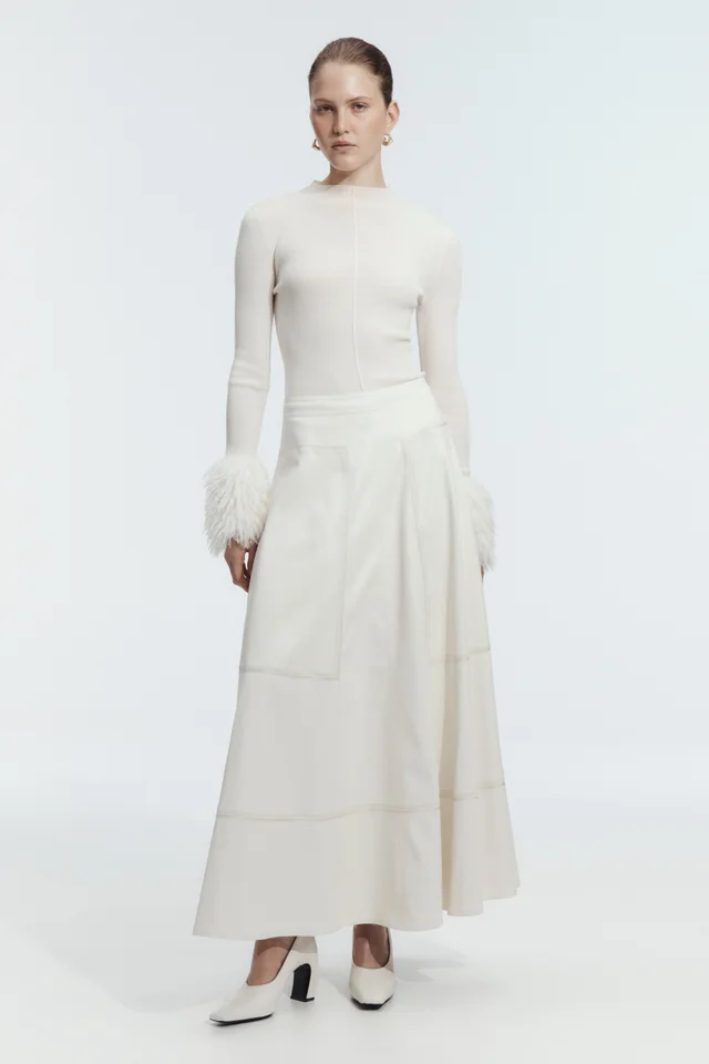 AJE Lotus Vegan Leather Midi Skirt in White from Aje, photo 1 of 1