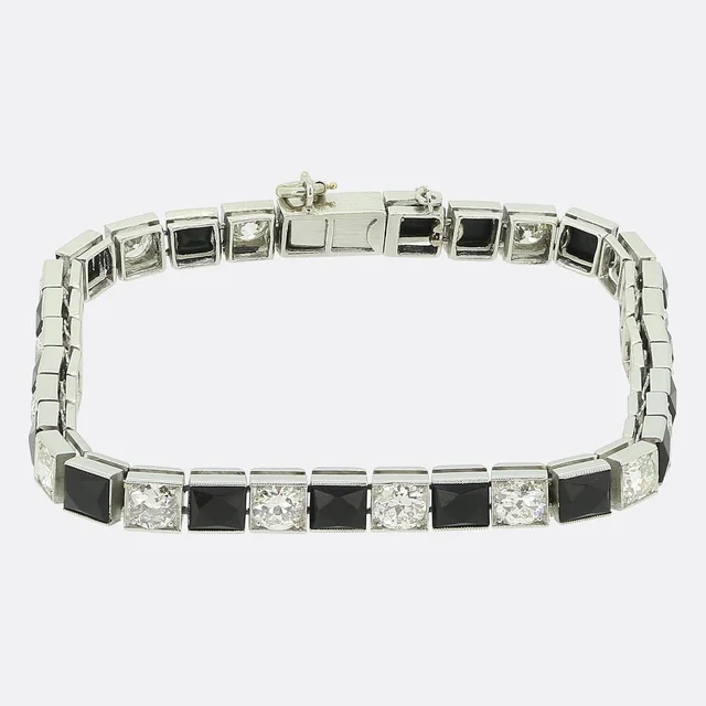 Van Cleef & Arpels Van Cleef & Aprels Art Deco Onyx and Diamond Line Bracelet from The Vintage Jeweller