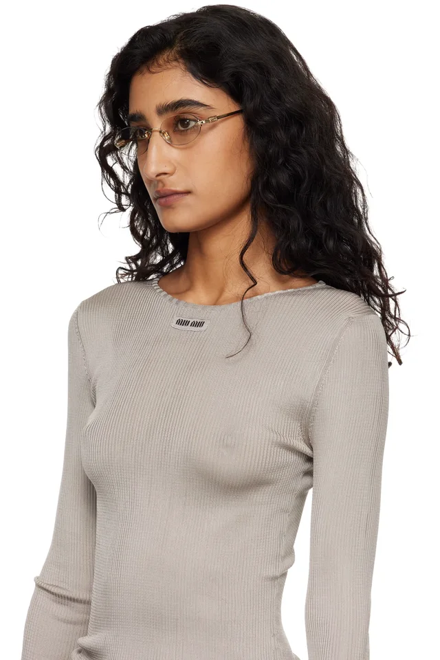 Miu Miu Eyewear Gold Rimless Oval Glasses, photo 4 of 4 from SSENSE