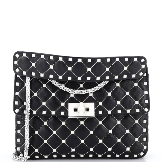 Valentino Garavani Free Rockstud Spike Flap Bag Quilted Leather Medium in black Leather from Rebag