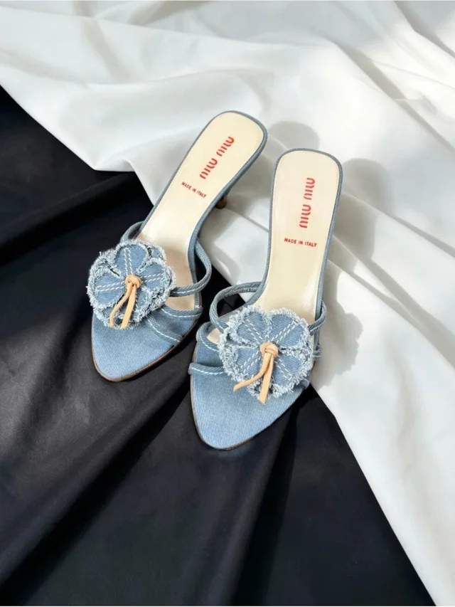 Miu Miu Light Blue Denim Floral Knot Slide Mules in brown|blue|neutral Denim from Poshmark