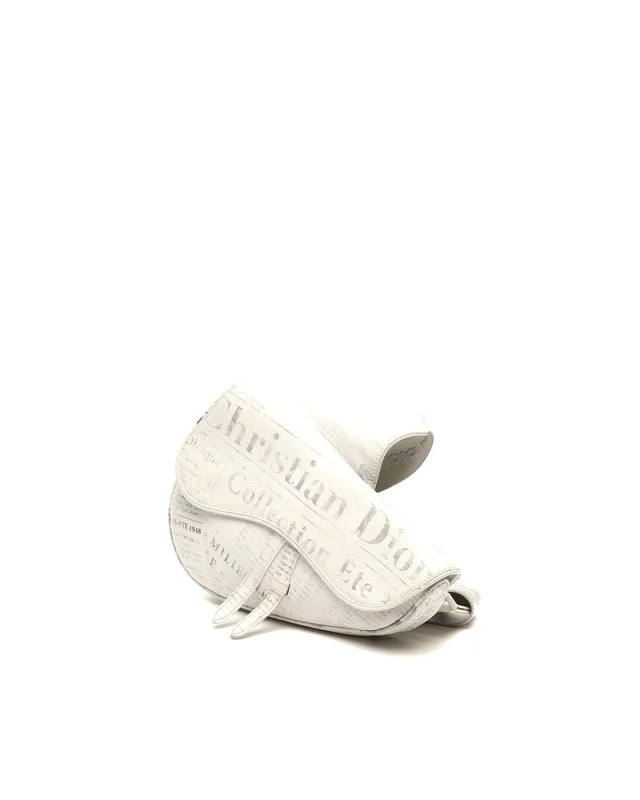 Dior X Daniel Arsham Newspaper Saddle Bag in Denim from A Retro Tale, photo 2 of 10