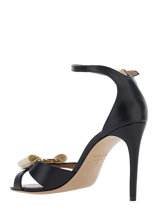 Ferragamo 'Vara' Black Heel Sandal with Bow Detail on the Front in Leather Woman in Black 90% Goat 10% Calf, photo 6 of 8 from Gaudenzi Boutique