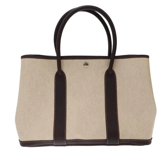 Hermès Garden Party PM Canvas Leather Tote Bag Beige Brown in Brown Canvas from The Reluxe