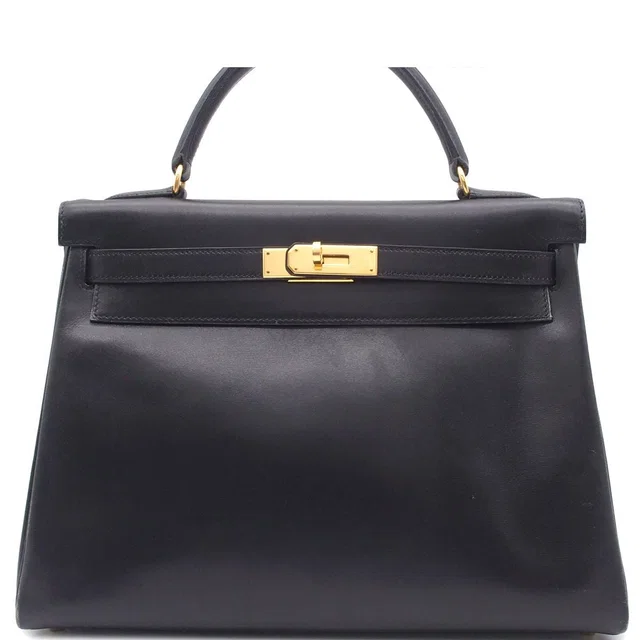 Hermès Kelly 32 Handbag in Box leather from The Reluxe