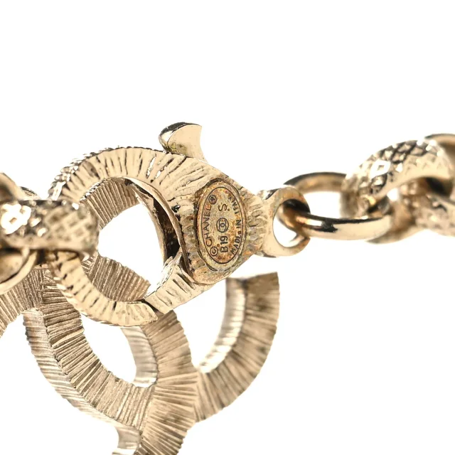 Chanel Metal Crystal Cha-Nel Logo Necklace Gold in Gold from FASHIONPHILE, photo 4 of 4