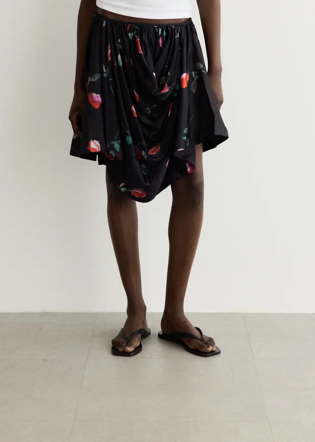 Ganni Printed Stretch Satin Draped Mini Skirt in Black from Incu, photo 1 of 1