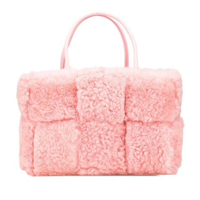 Bottega Veneta Leather Intrecciato Pouch in pink Woven leather from Poshmark, photo 1 of 1