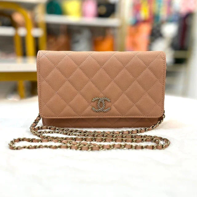 Chanel Peach / Coral Caviar 23P WOC In GHW in Caviar leather from Luxury Promise
