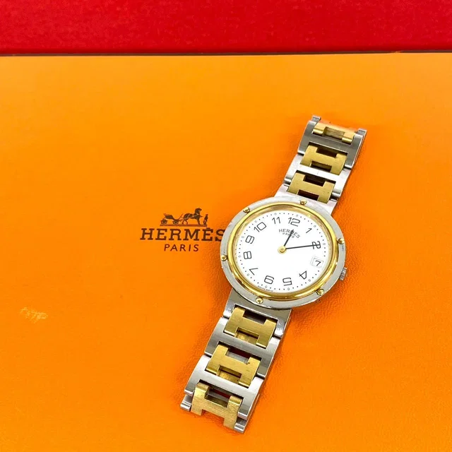 Hermès Vintage Clipper Stainless Steel Quartz Watch Silver Gold in Gold from The Reluxe
