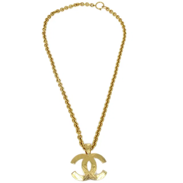 Chanel Quilted Charm Gold Chain Pendant Necklace Accessories 94A in Gold from AMORE Vintage Tokyo