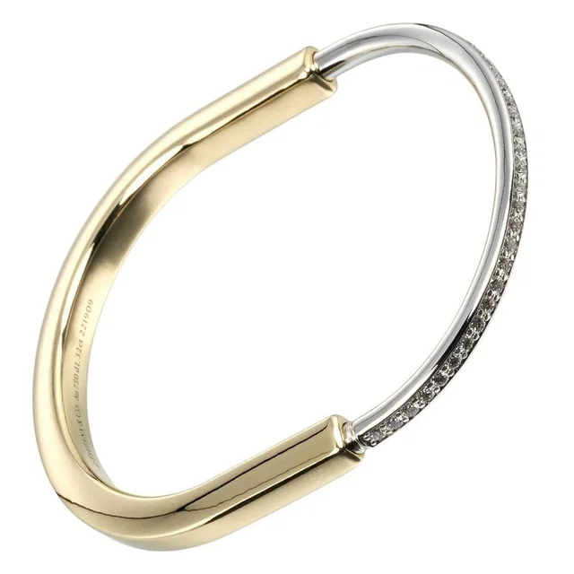 Tiffany & Co. Lock 18K Yellow Gold White Diamond Bracelet in White from The Reluxe