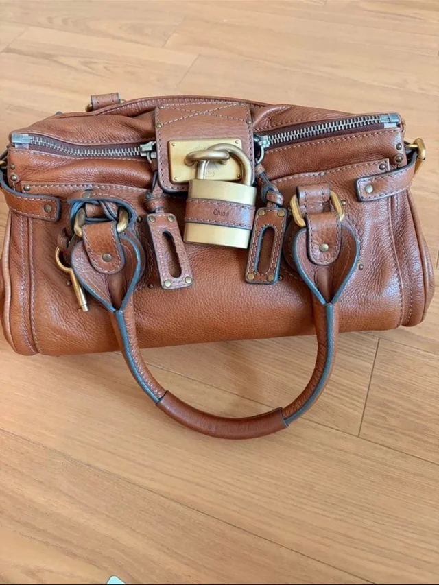 Chloé Tan Brown Leather Satchel With Signature Padlock in brown|red Leather from Poshmark, photo 1 of 1