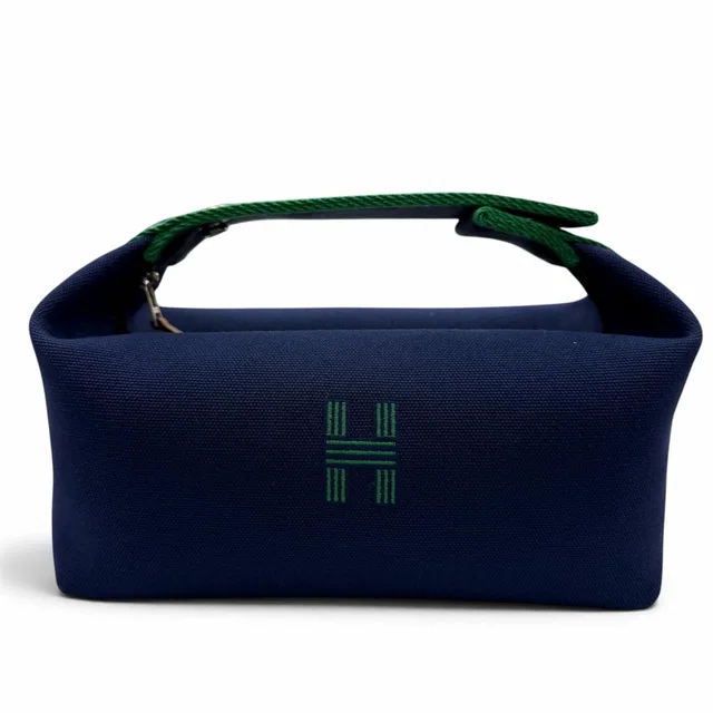 Hermès Brid-a-brac PM Silver Sellier H Logo Canvas Pouch Handbag Navy in Navy Canvas from The Reluxe