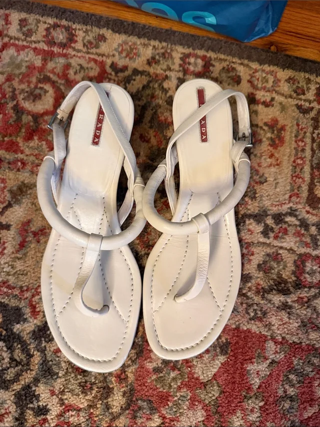 Prada Leather Ring-Accent Thong Sandals in white from Poshmark, photo 1 of 1