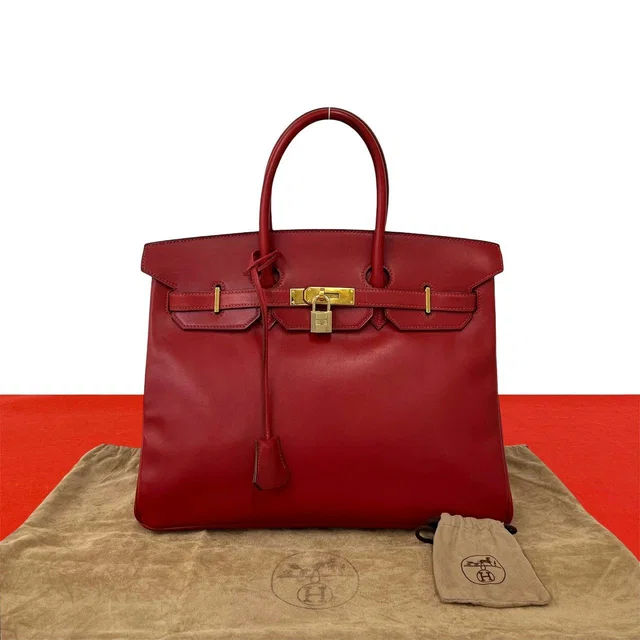Hermès Bag with Key Vintage Birkin 35 Box Calf Leather Handbag Rouge in Red Box leather from The Reluxe
