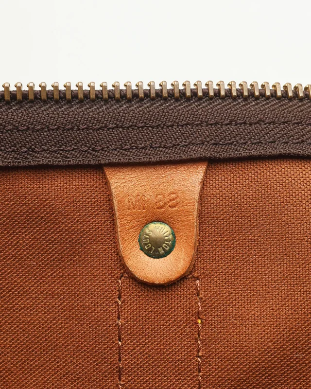 Louis Vuitton Monogram Keepall 60 Weekend Bag in Coated canvas from A Retro Tale, photo 12 of 13