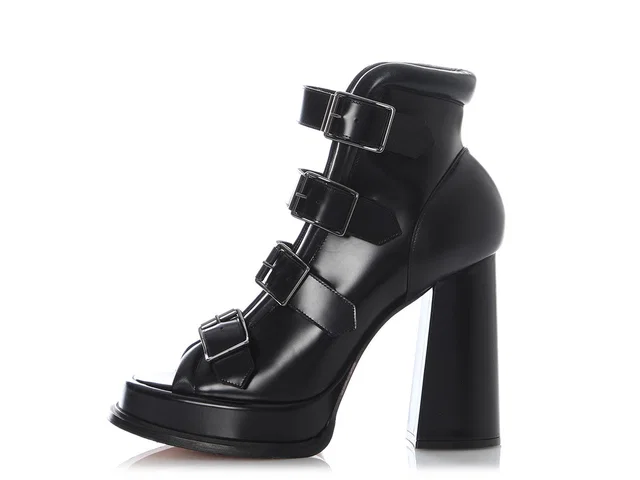 Alexander McQueen Black Rave Buckle Boots in Black Leather from Ann's Fabulous Finds