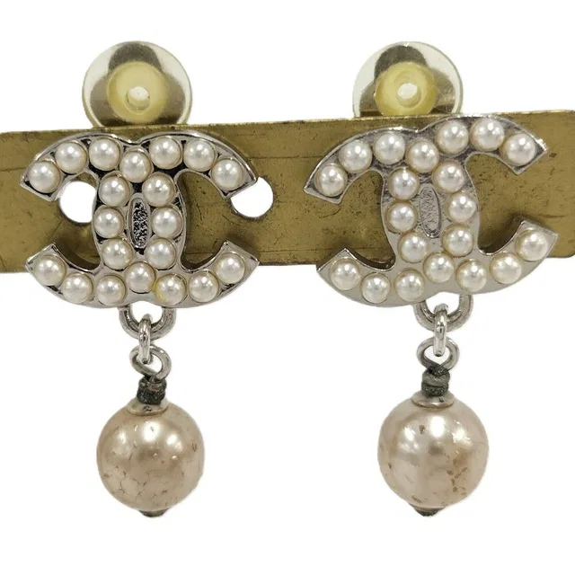 Chanel Earrings CC Pearl Plated Silver in Silver from The Reluxe