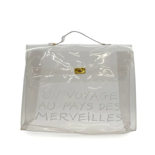 Hermès Vinyl Kelly Souvenir De L' Exposition 1997 Clear Hand Bag Gold Hardware from Luxury Promise