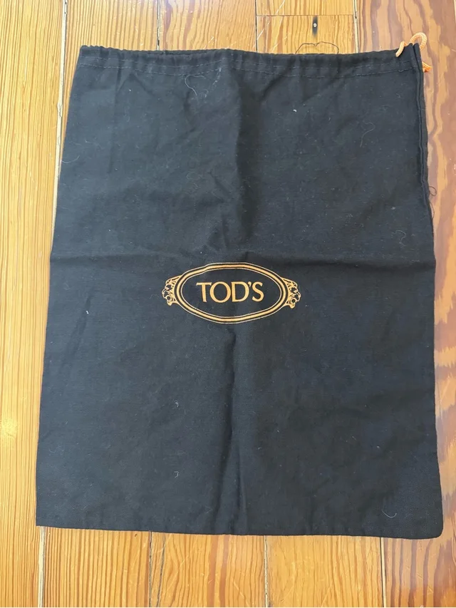 Tod's Dust Bag in brown|red from Poshmark