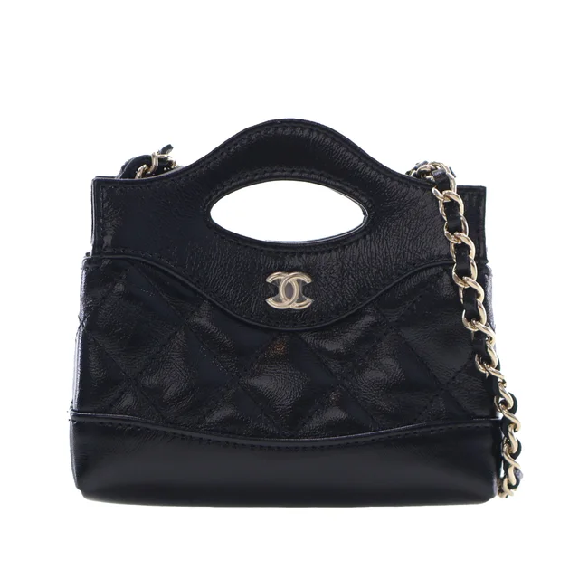 Black Chanel Micro Shiny Lambskin 31 Clutch with Chain Satchel in Black Lambskin from Designer Revival