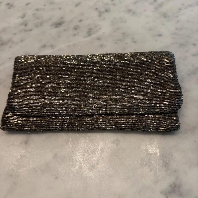 Moynat Women's Clutch bags - Brown/Gold in brown|red|gold from Depop, photo 1 of 1