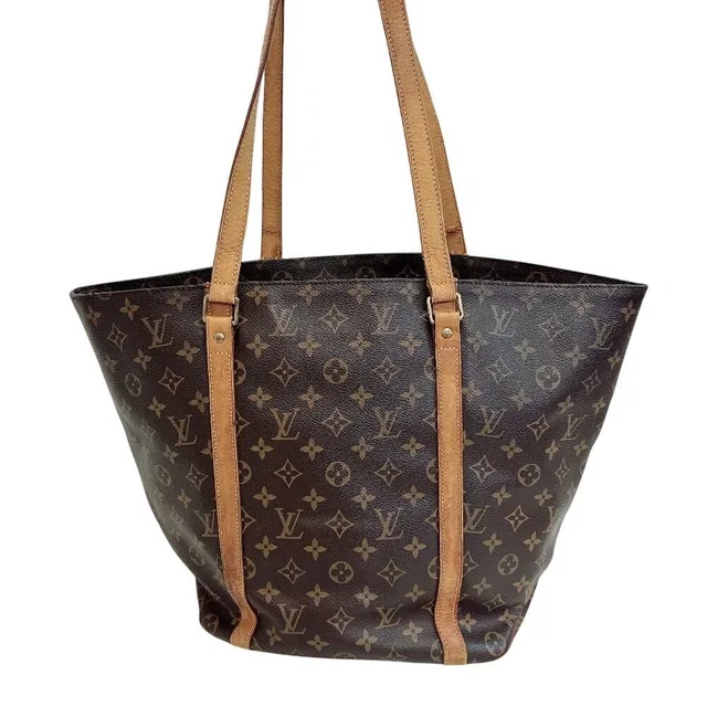 Louis Vuitton Sac Shopping Monogram Tote Bag Brown in Brown from The Reluxe