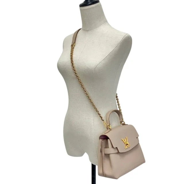 Louis Vuitton Lockme Ever Mini chain 2way shoulder bag in Beige Calfskin from LuxUness, photo 10 of 19