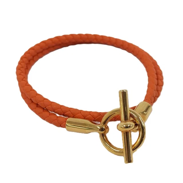 Hermès Glenan Double Tour Bracelet Orange Gold in Orange Leather from The Reluxe