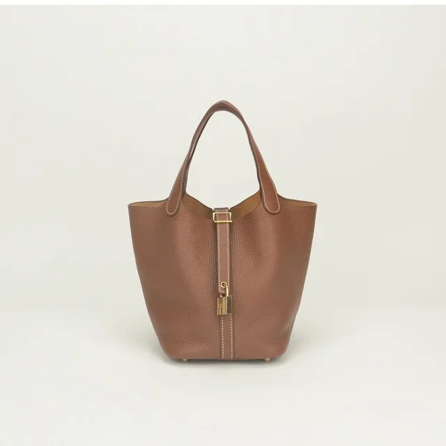 Hermès Picotin Lock PM 18 Tote Bag Taurillon Clemence Gold Brown in Brown Clemence leather from The Reluxe