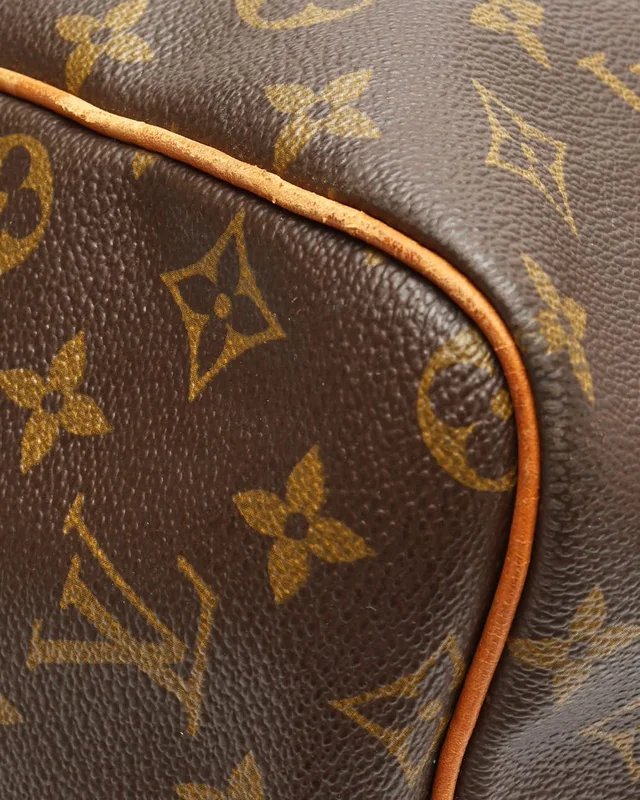 Louis Vuitton Monogram Keepall Bandoulière 60 Weekend Bag in Coated canvas from A Retro Tale, photo 7 of 15