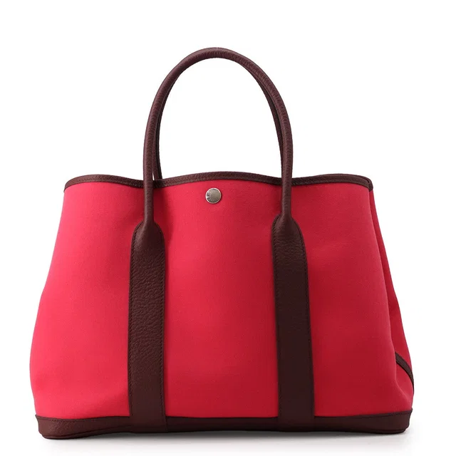 Hermès Garden Party Rose Extreme/Bordeaux Toile Officier Negonda Leather Size PM in Burgundy Leather from GALLERY RARE