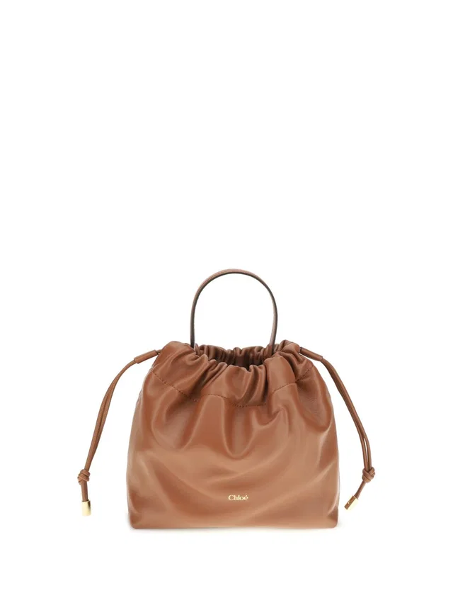 Chloé Leather Drawstring Top Handle Bag — Brown in Brown Leather from HEWI