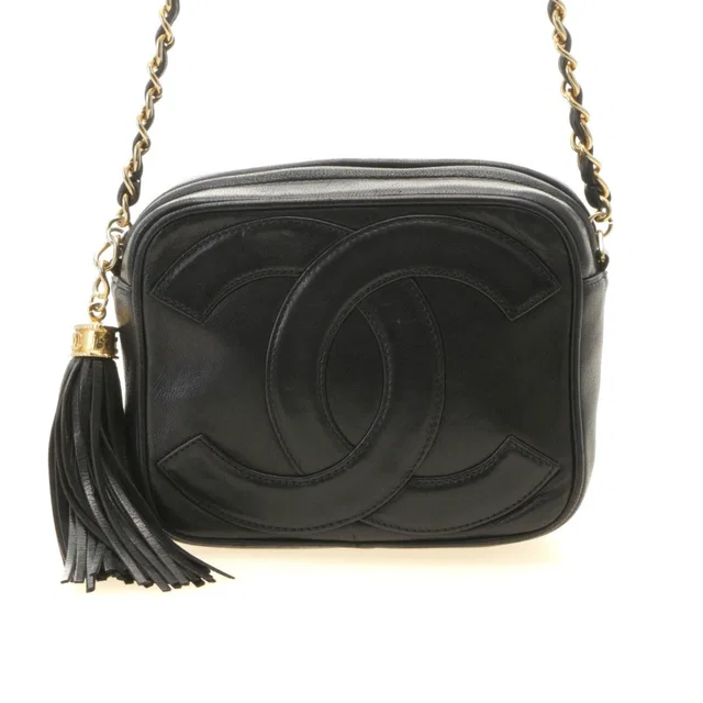 Chanel CC Logo Tassel Chain Shoulder Black Gold Lambskin Bag in Black Lambskin from The Reluxe