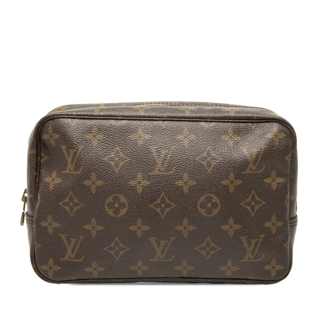 Brown Louis Vuitton Monogram Trousse Toilette 23 Clutch Bag in Brown Coated canvas from Designer Revival