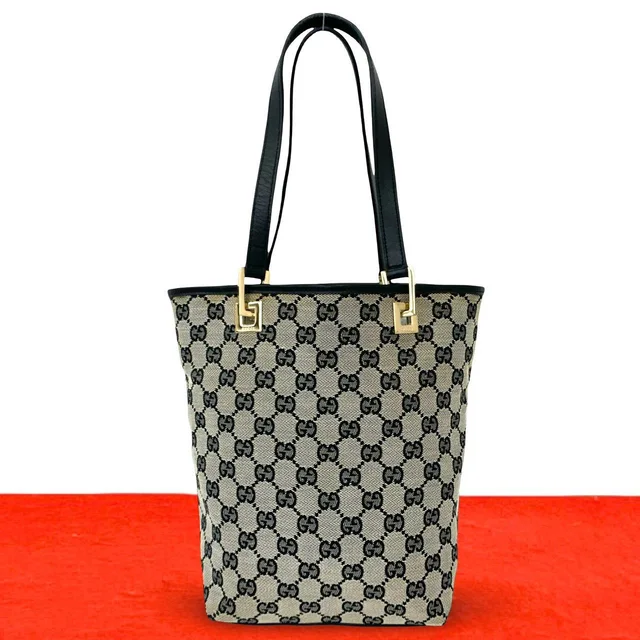 Gucci GG Logo Pattern Canvas Leather Handbag Mini Tote Black in Black Canvas from The Reluxe