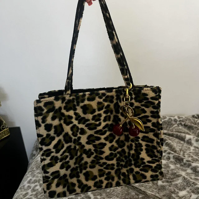Coach Women's Bag - Multi/Brown in multicolor|brown|red from Depop, photo 1 of 1